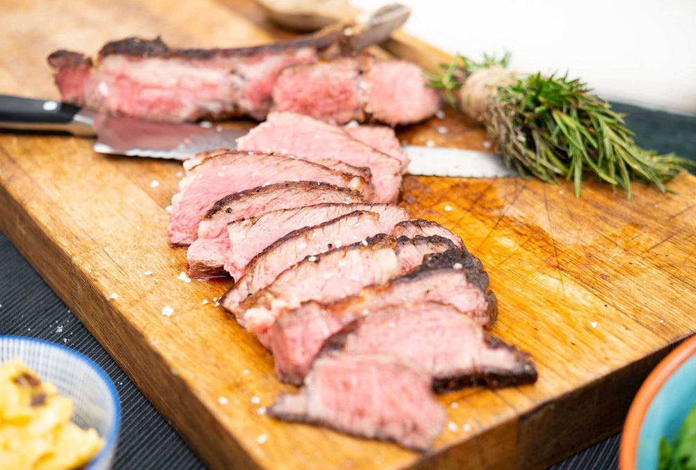 Butcher In Stripped Apron Rolling Flour and Dough 