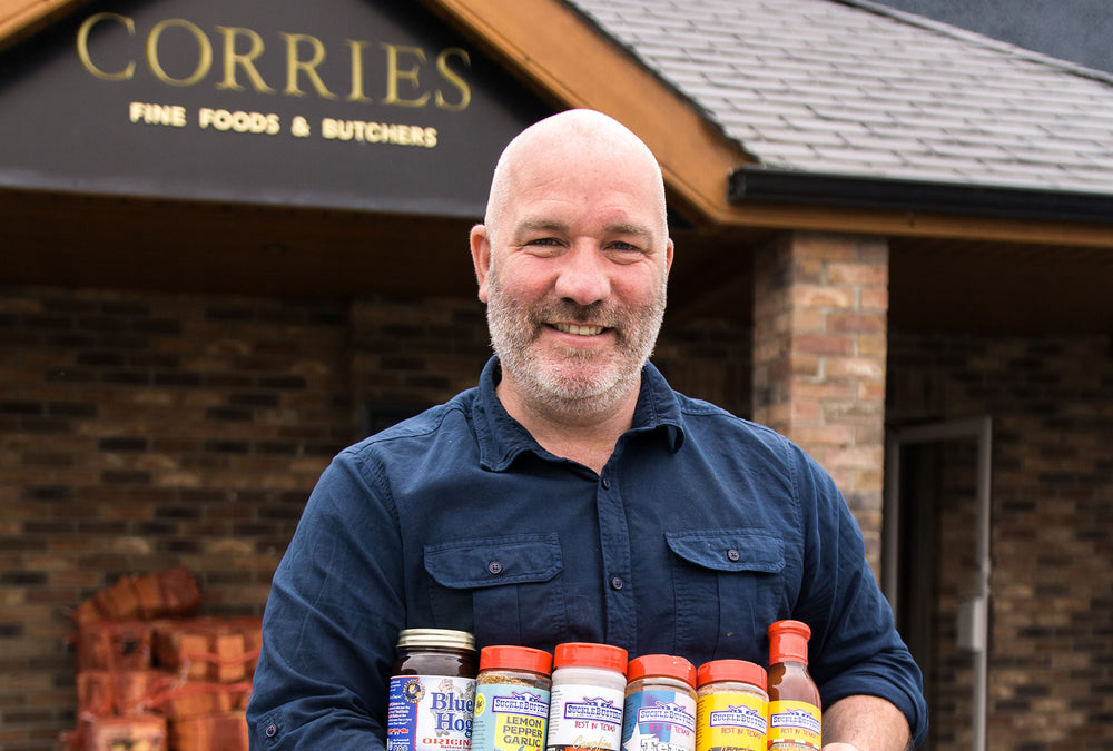 Butcher Slicing Raw Meat